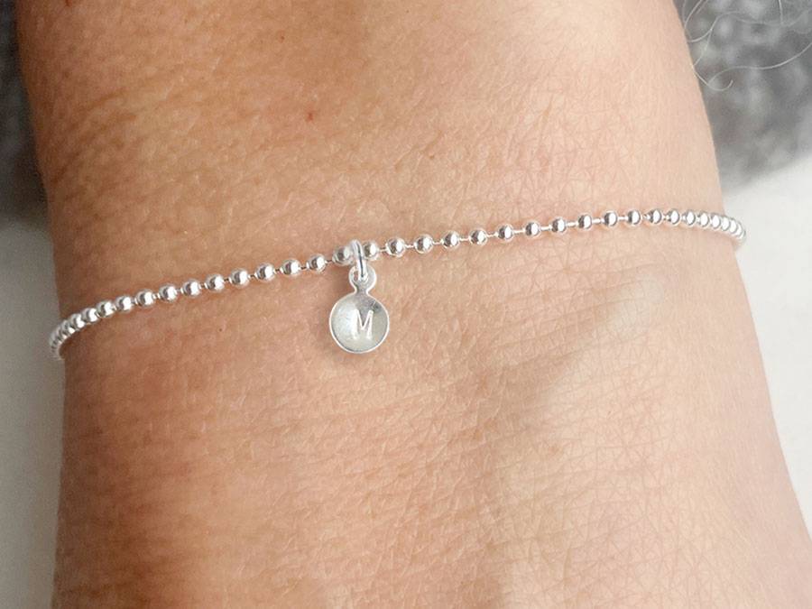 Renna Deluxe Armband mit STERN und Buchstaben-Anhänger Silber Große Rabatte