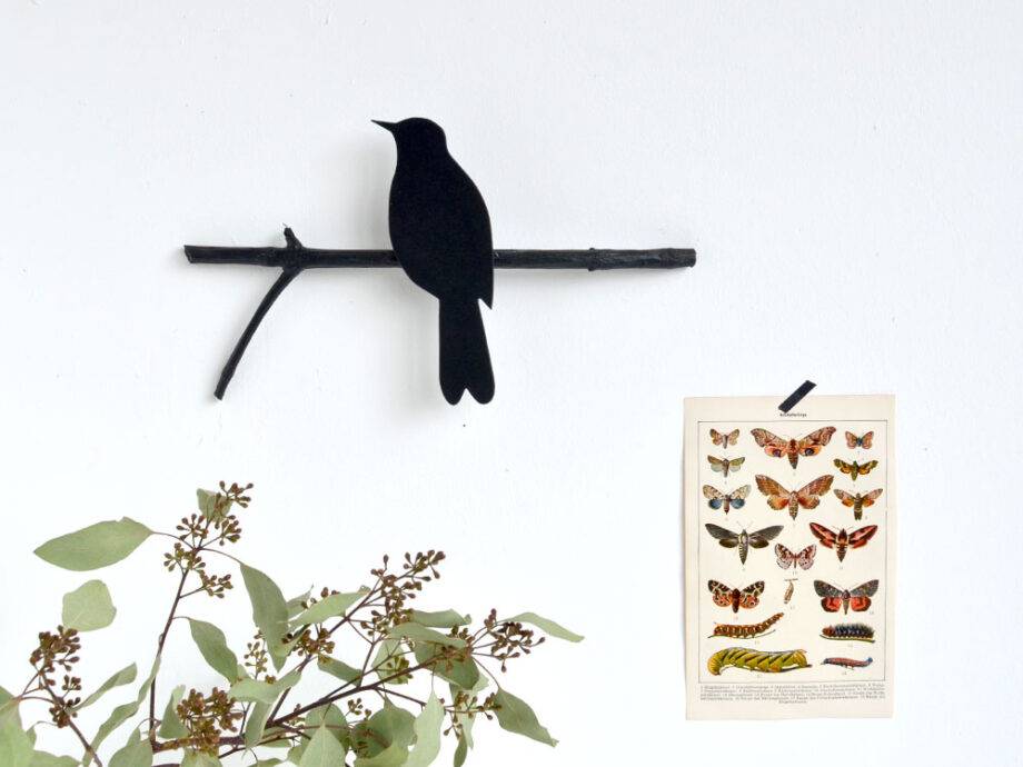 Renna Deluxe Amsel in Fraktur auf dem Ast 2025