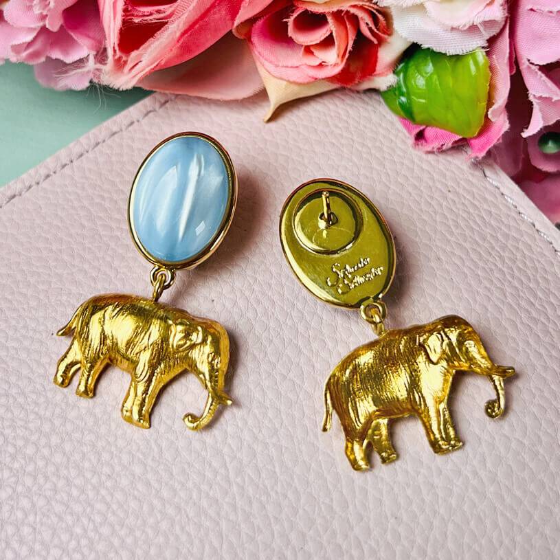 SchwesterSchwester Ohrstecker in Hellblau mit vergoldetem Elefant Zeitlich begrenztes Angebot